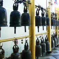 Many many bells for you to ring for good luck at Doi Suthep temple. www.chiangmaitourcenter.com