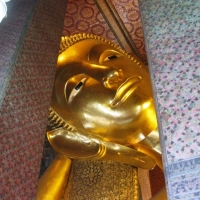 The face of the biggest reclining Buddha in Thailand. www.chiangmaitourcenter.com