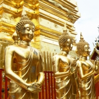 The Buddha images around the main golden pagoda at Wat Doi Suthep. www.chiangmaitourcenter.com