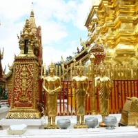 The Buddha images around the main golden pagoda at Wat Doi Suthep. www.chiangmaitourcenter.com