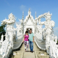 Photo taken from the walk way to the main hall of White temple. www.chiangmaitourcenter.com